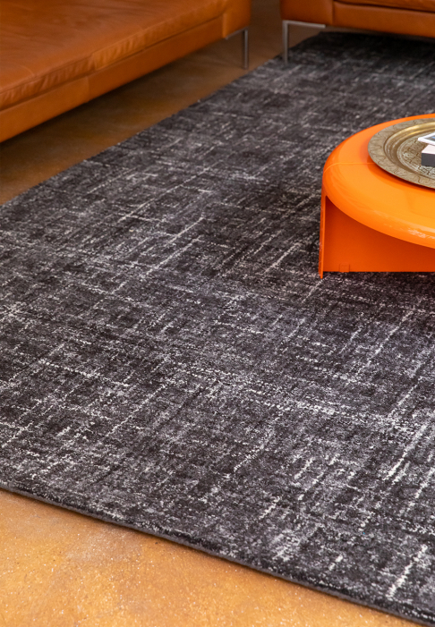 Tapis laine uni dynamique détail gros plan