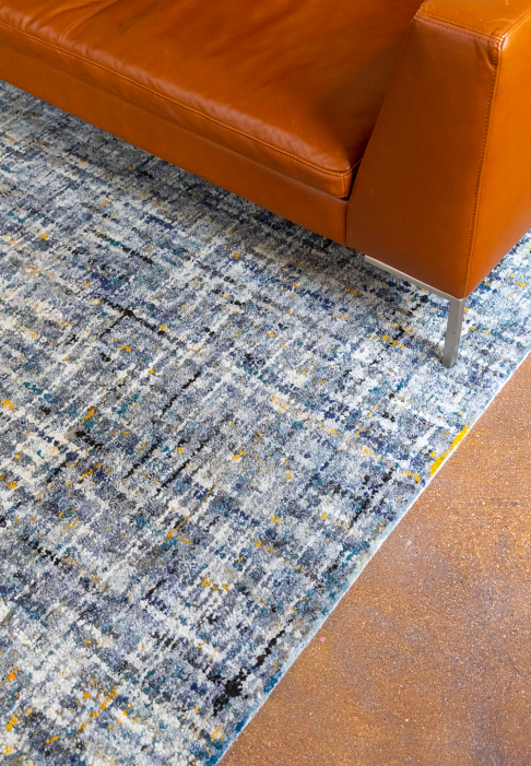 Tapis laine uni dynamique détail gros plan