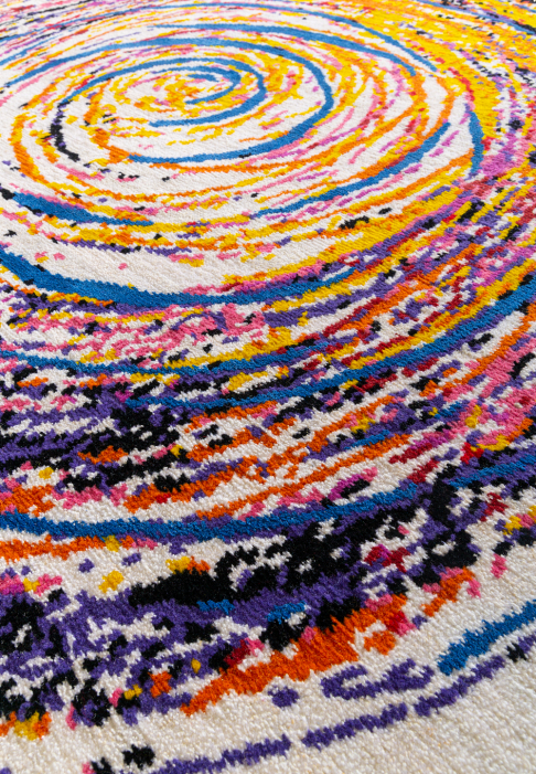 White rug with multicolour spiral, close-up