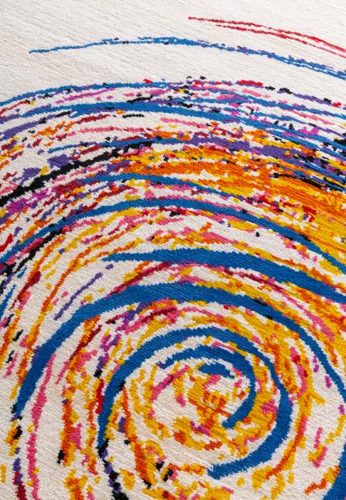 White rug with multicolour spiral, close-up